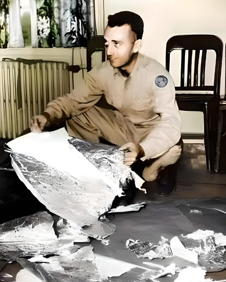 Major Jesse Marcel 1947 holding an alleged piece of weather balloon debris - 1947